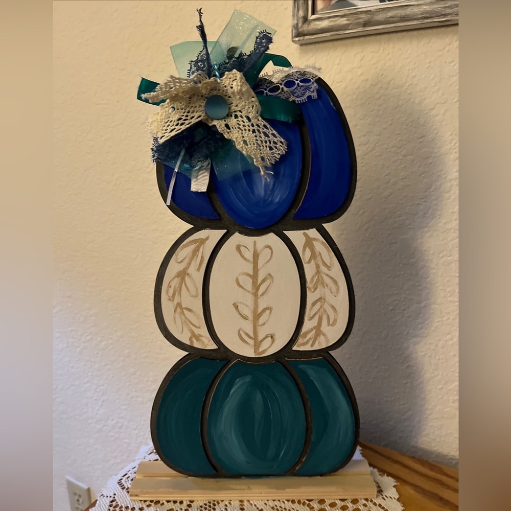 TRIO OF STACKED, HANDPAINTED PUMPKINS ON WOOD